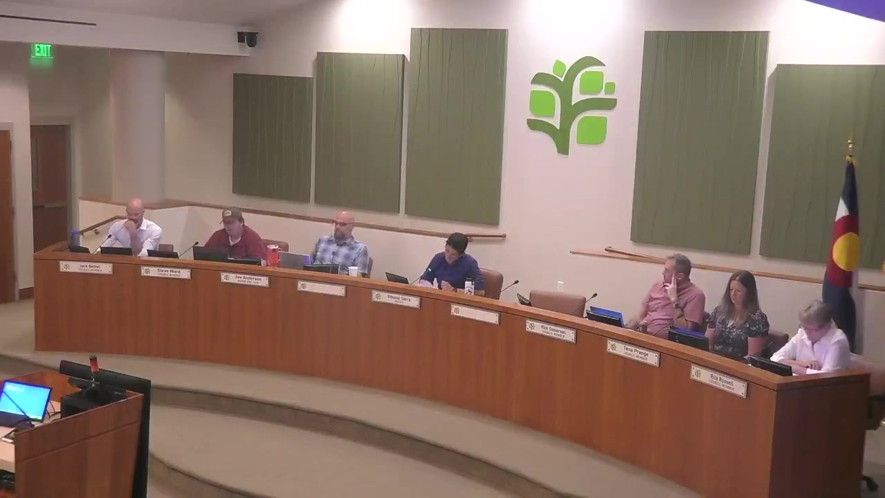 Englewood City Council meeting in session at the dais.