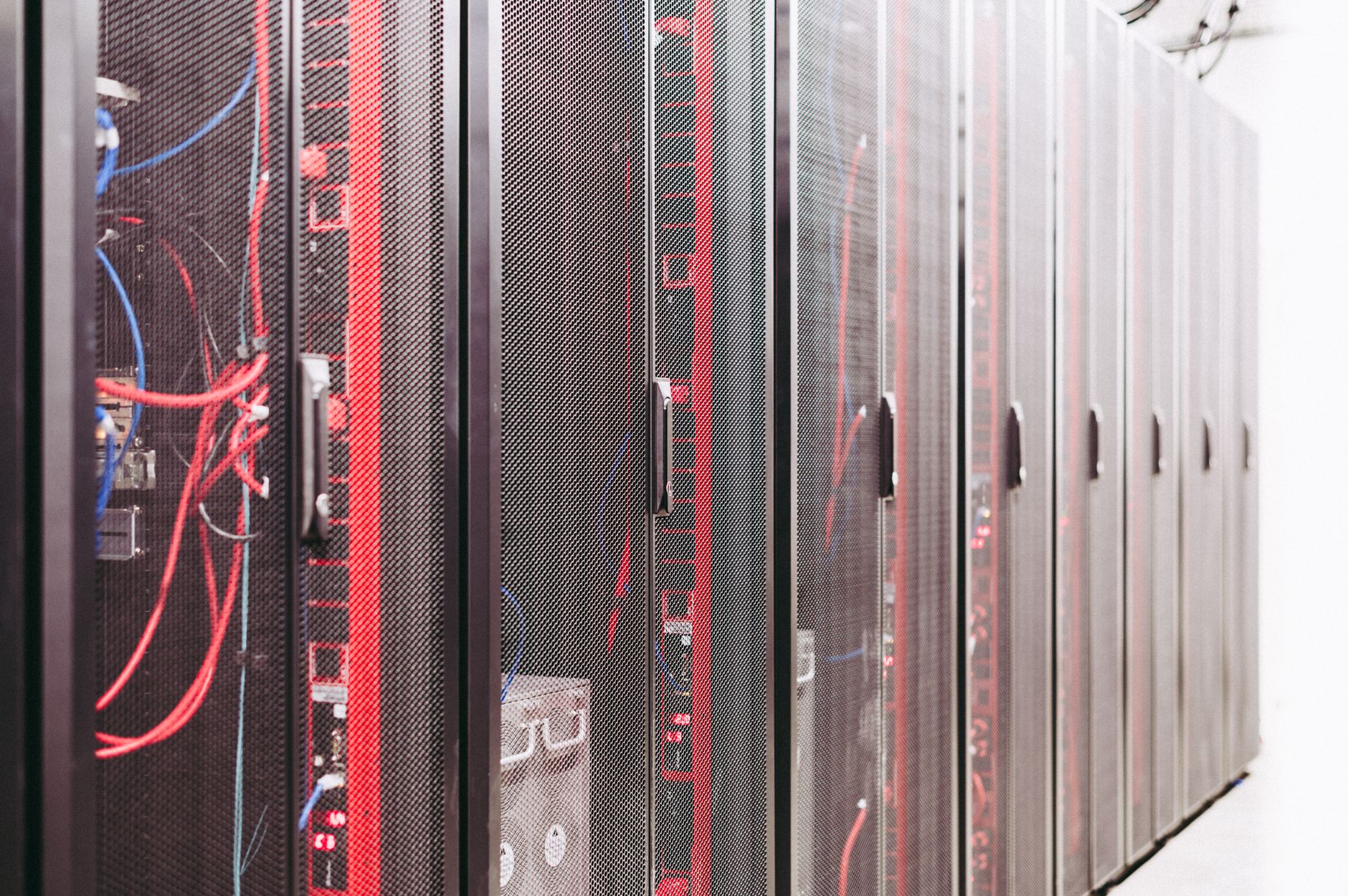 Server racks and cabling inside a data center.