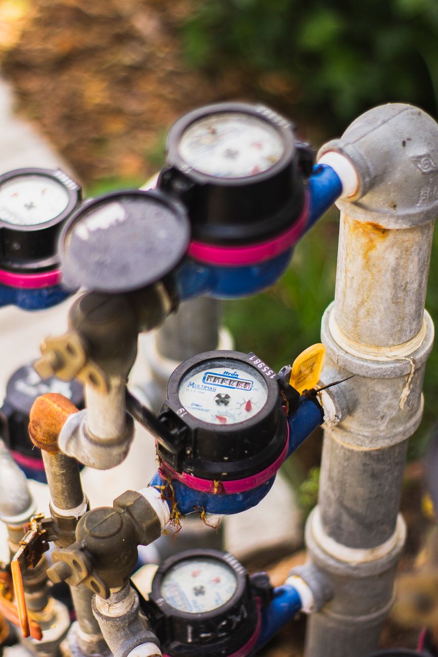 Water meters connected to pipes.